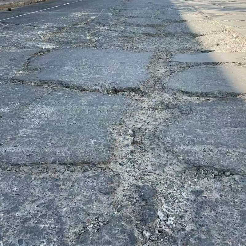 潮南路面起砂露石子修补料